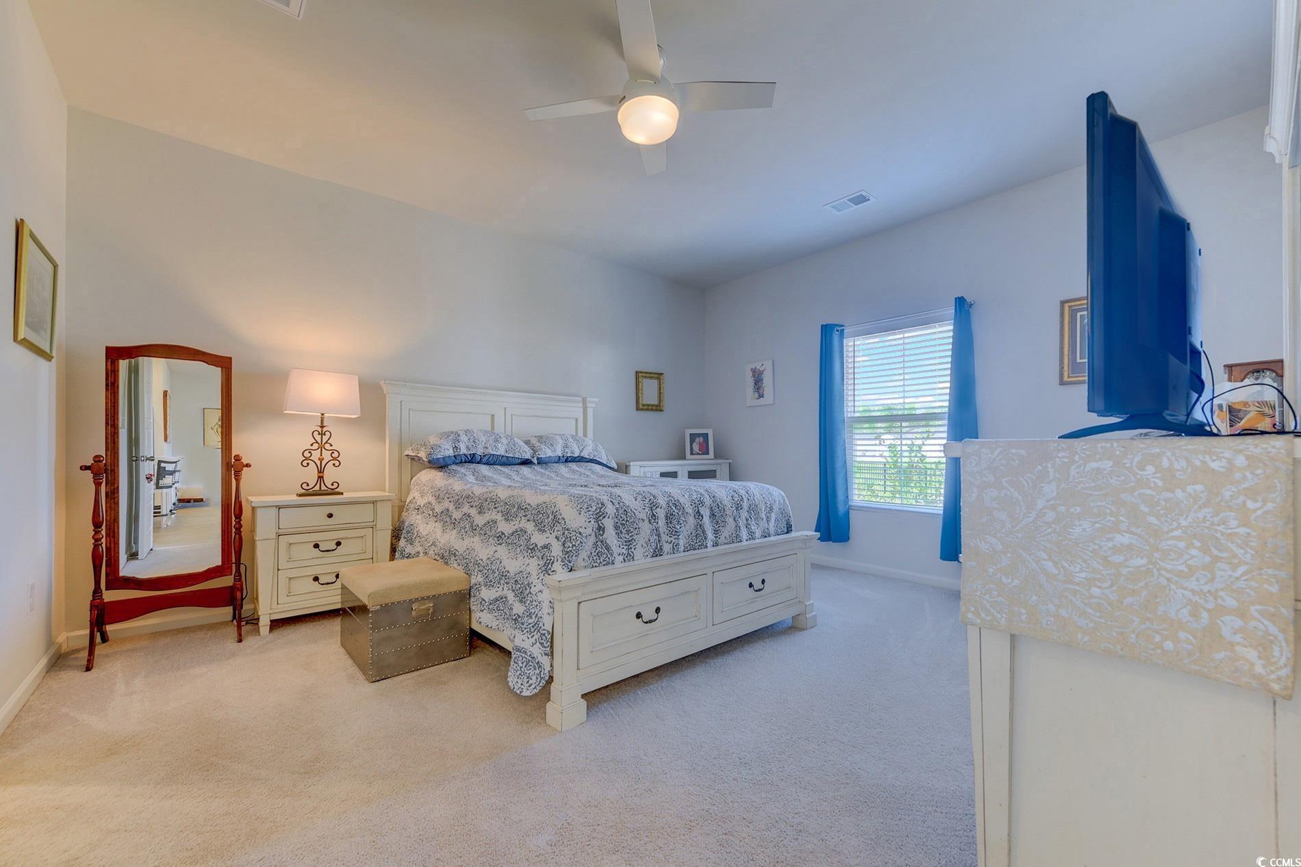 177 Fox Rae Drive Conway, SC 29526 - Photo 14 of 39 Bedroom with light colored carpet and ceiling fan