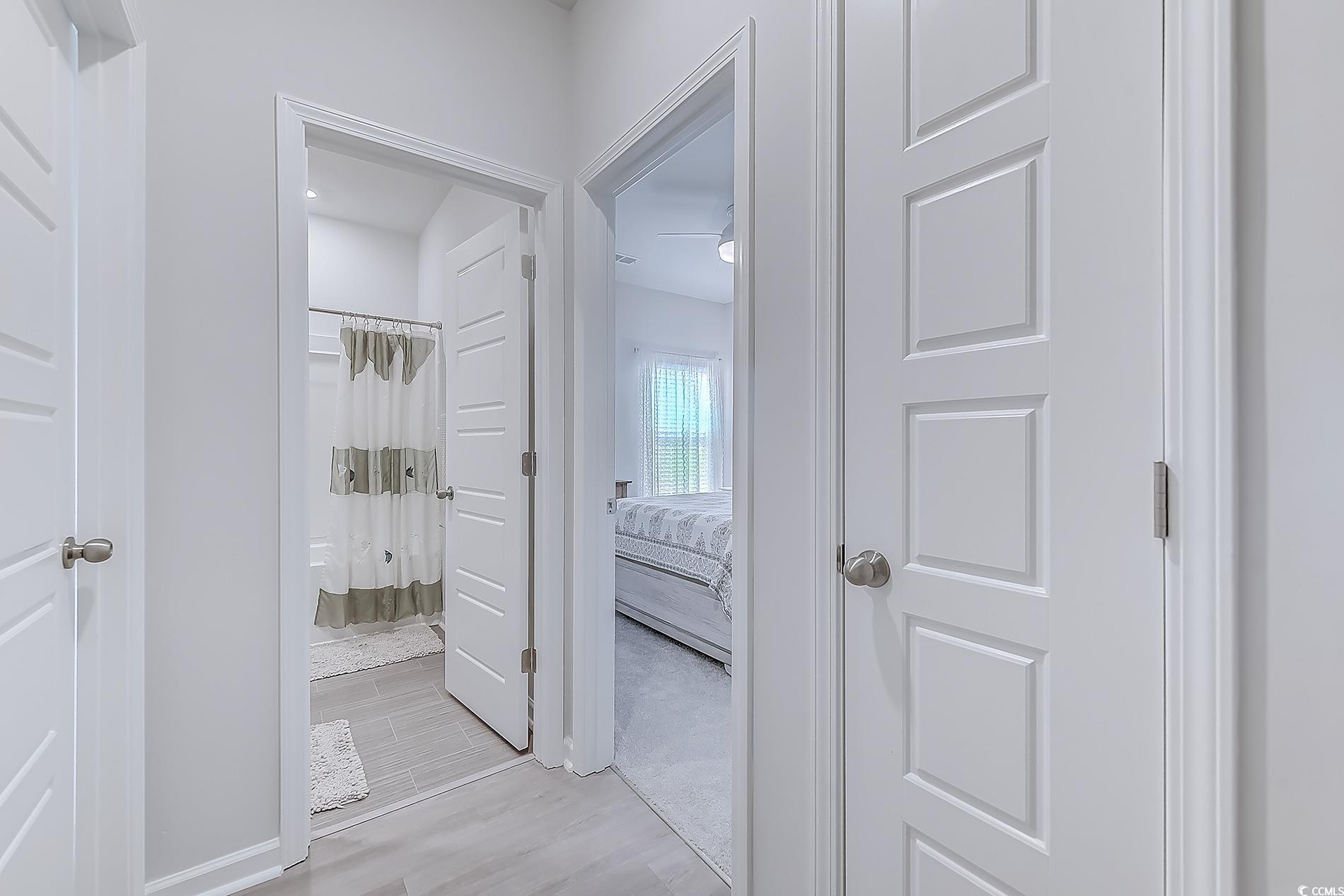 177 Fox Rae Drive Conway, SC 29526 - Photo 19 of 39 Corridor featuring light wood finished floors
