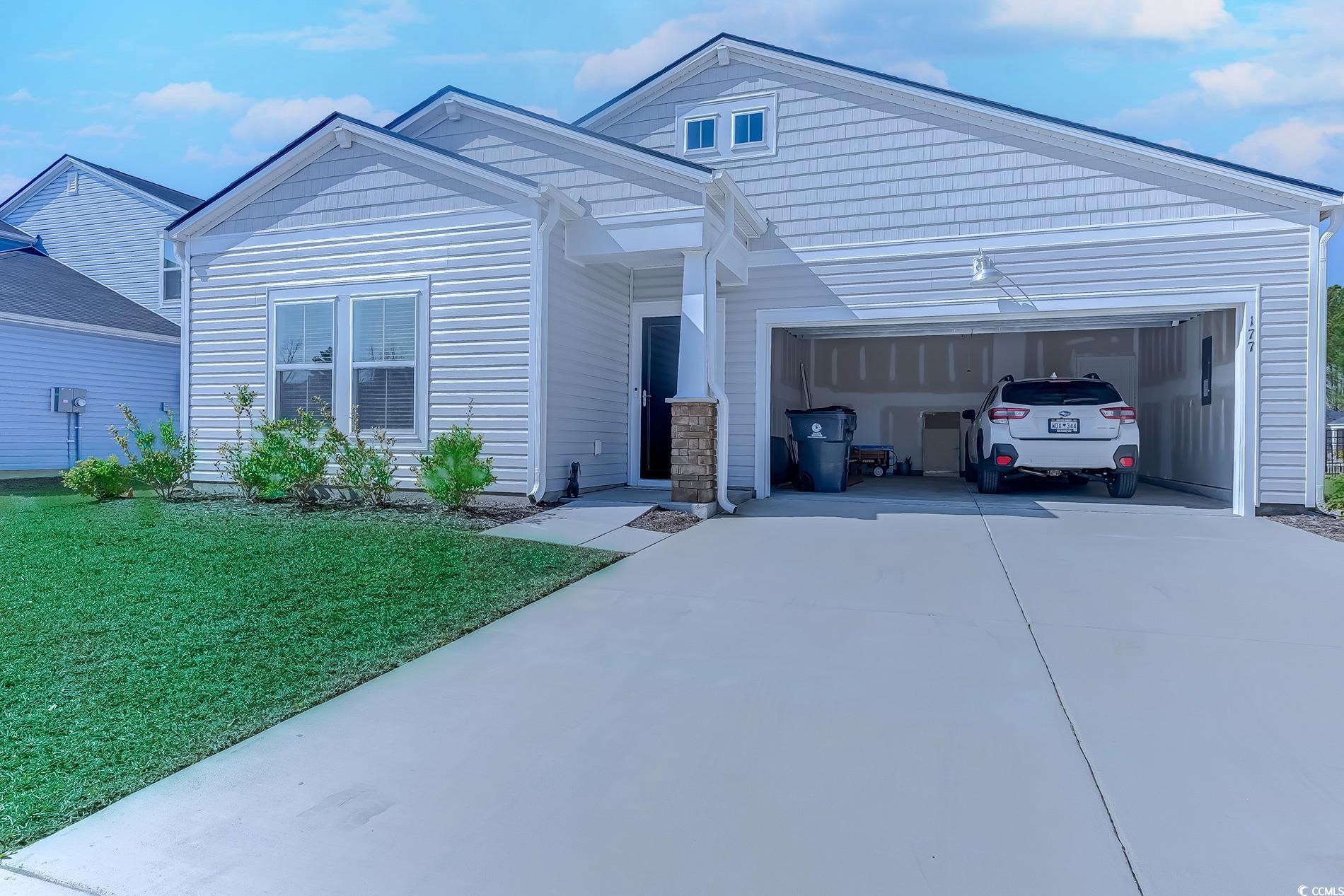 177 Fox Rae Drive Conway, SC 29526 - Photo 2 of 39 View of front of property with driveway, a front lawn, and a garage