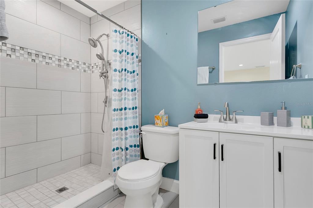 1801 West Highway 329 Citra, FL 32113 - Photo 11 of 34 a bathroom with a sink toilet and shower