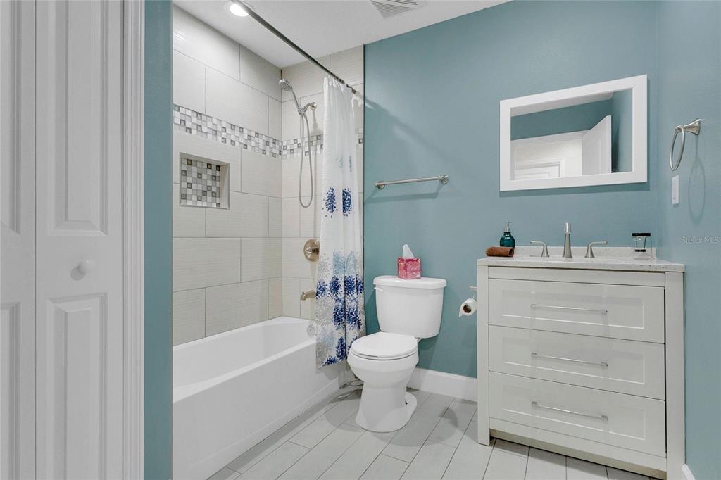 1801 West Highway 329 Citra, FL 32113 - Photo 14 of 34 a bathroom with a sink toilet and shower