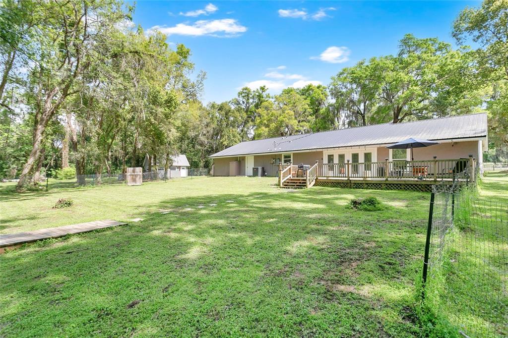 1801 West Highway 329 Citra, FL 32113 - Photo 18 of 34 a front view of house with yard and green space