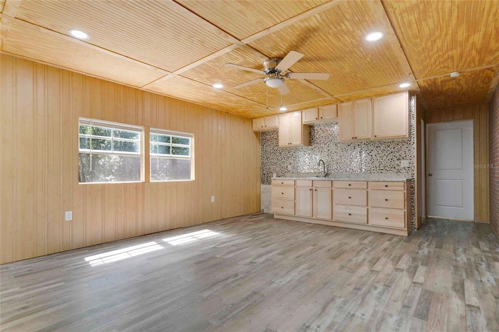 1801 West Highway 329 Citra, FL 32113 - Photo 20 of 34 a view of a kitchen with wooden floor and a window