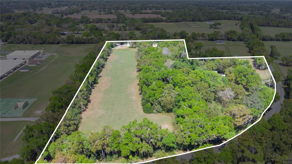1801 West Highway 329 Citra, FL 32113 - Photo 2 of 34 an aerial view of a house