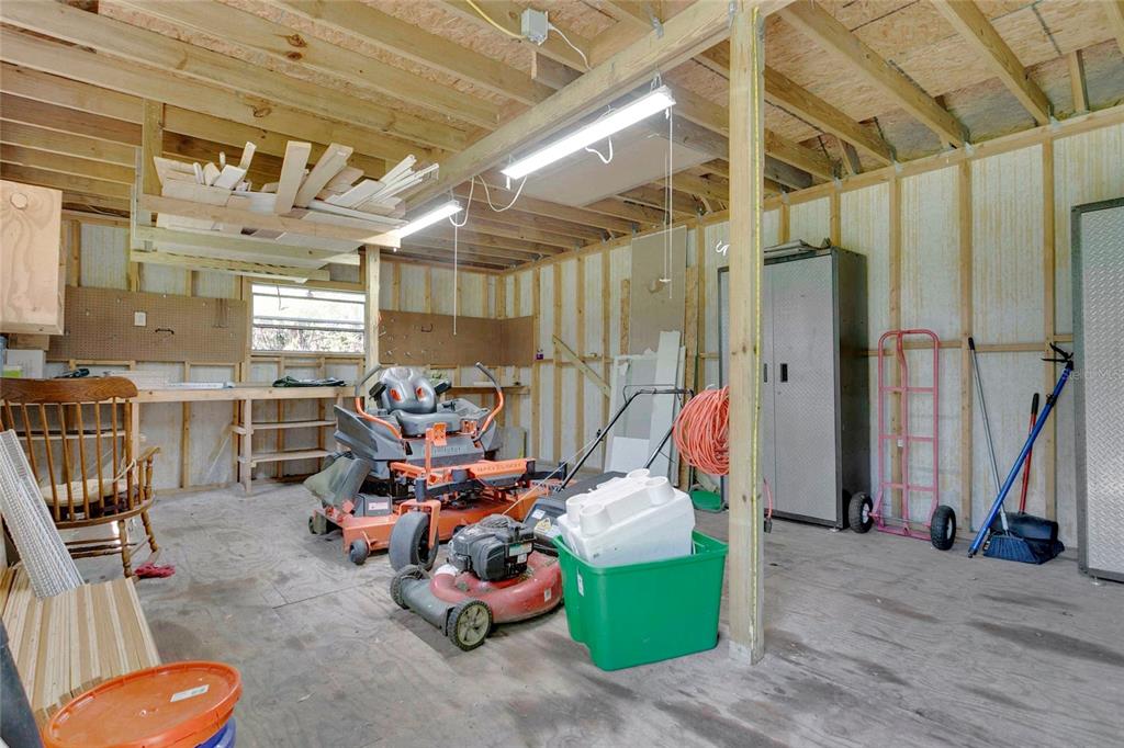1801 West Highway 329 Citra, FL 32113 - Photo 23 of 34 a storage room with lots of stuff and furniture