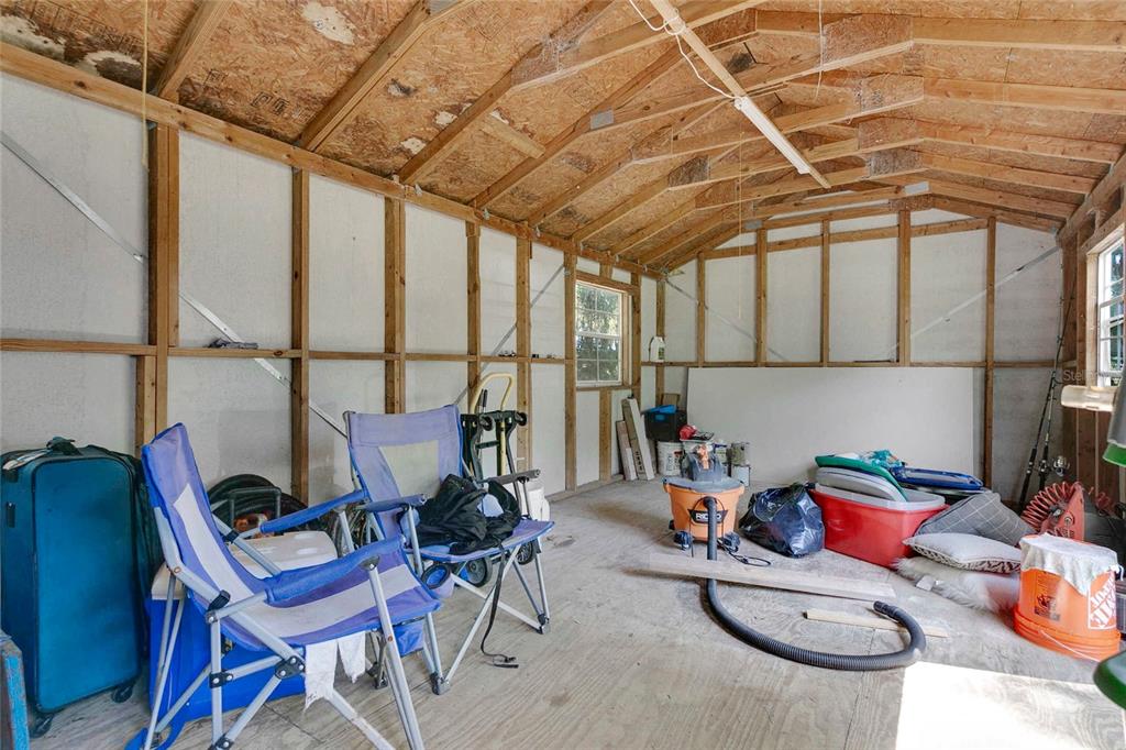 1801 West Highway 329 Citra, FL 32113 - Photo 24 of 34 a room with furniture and air hockey table