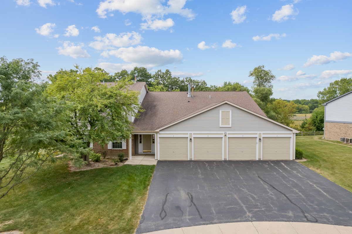 320 Crestview Drive, Unit B Wauconda, IL 60084 - Photo 2 of 28 a view of a house with a yard