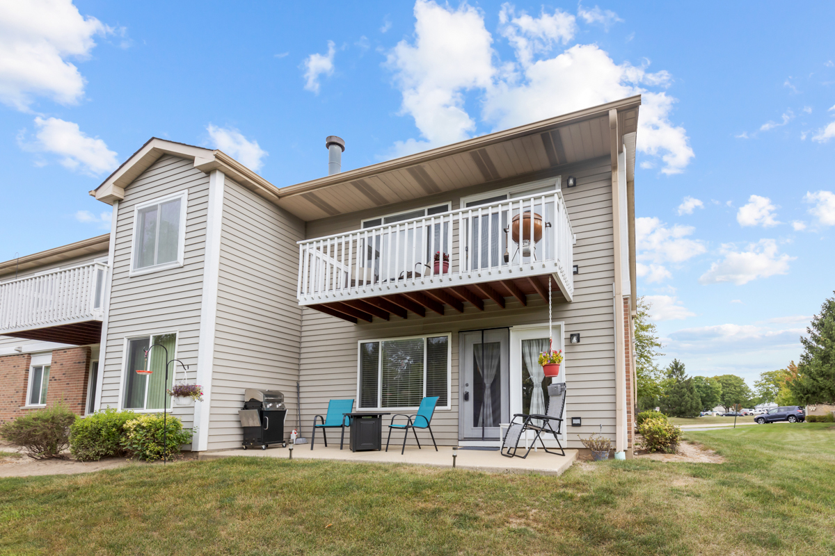 320 Crestview Drive, Unit B Wauconda, IL 60084 - Photo 26 of 28 a front view of a house with a porch