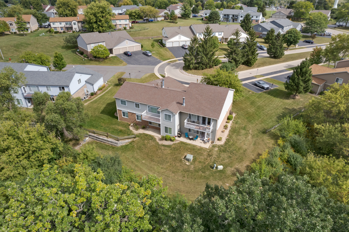 320 Crestview Drive, Unit B Wauconda, IL 60084 - Photo 6 of 28 an aerial view of a house with a garden