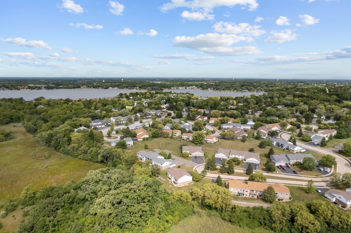 320 Crestview Drive, Unit B Wauconda, IL 60084 - Photo 8 of 28 an aerial view of residential building with green space