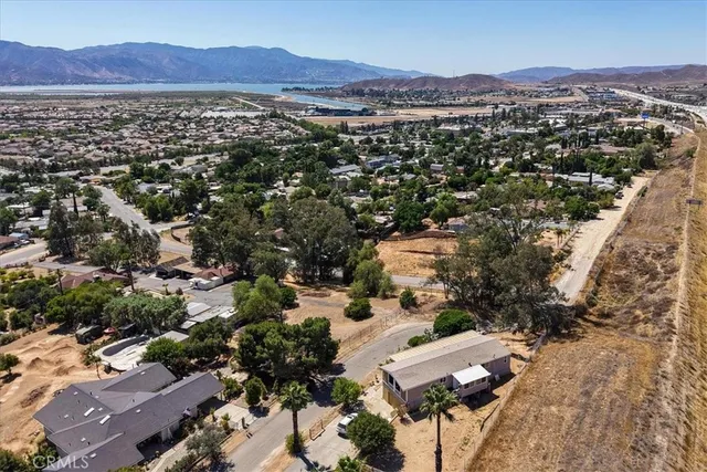 an aerial view of residential house with an outdoor space