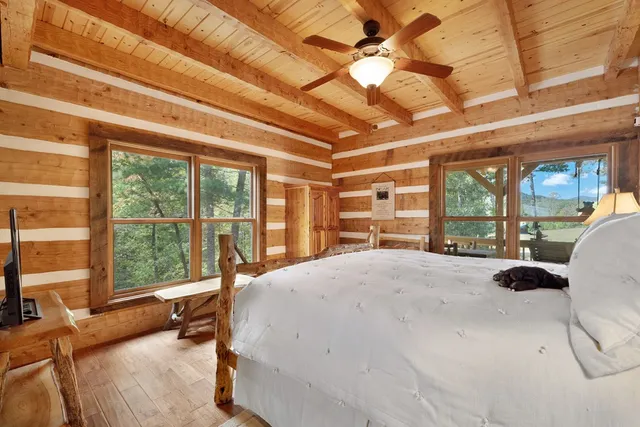 a bathroom with a granite countertop sink mirror and a