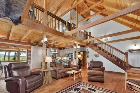 a kitchen with stainless steel appliances granite countertop sink stove top oven and cabinets