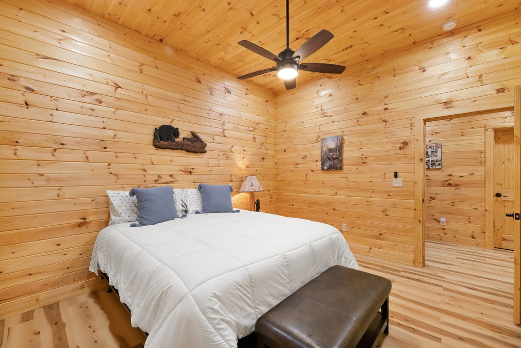 179 Cessna Loop Blue Ridge, GA 30513 - Photo 38 of 57 a bedroom with a bed and a ceiling fan