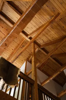 a view of a house with a yard and pathway