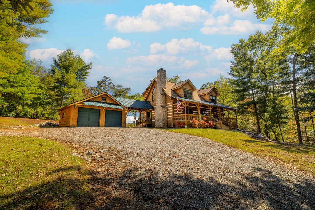 179 Cessna Loop Blue Ridge, GA 30513 - Photo 43 of 57 a front view of a house with a yard