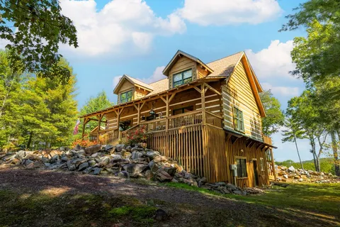 a view of backyard with green space