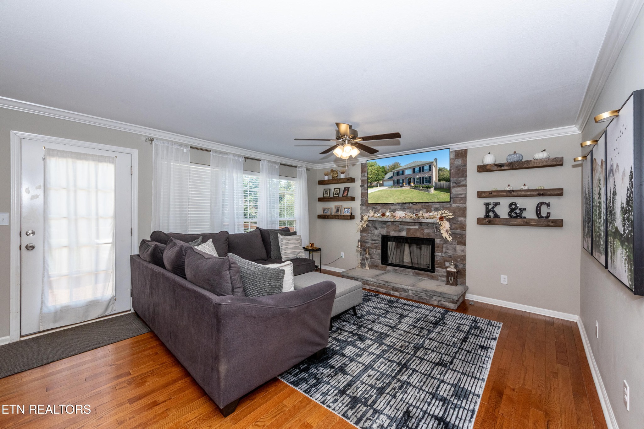 1600 Legacy Park Road Knoxville, TN 37922 - Photo 12 of 58 a living room with furniture and a fireplace