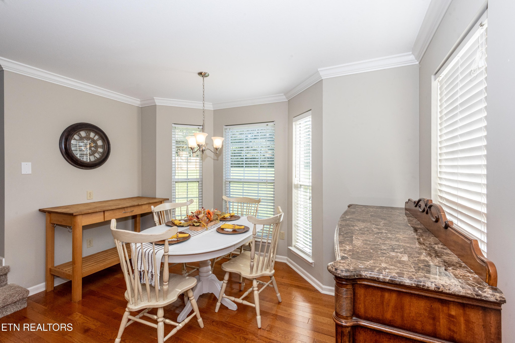 1600 Legacy Park Road Knoxville, TN 37922 - Photo 19 of 58 a view of a dining room with furniture window and wooden floor