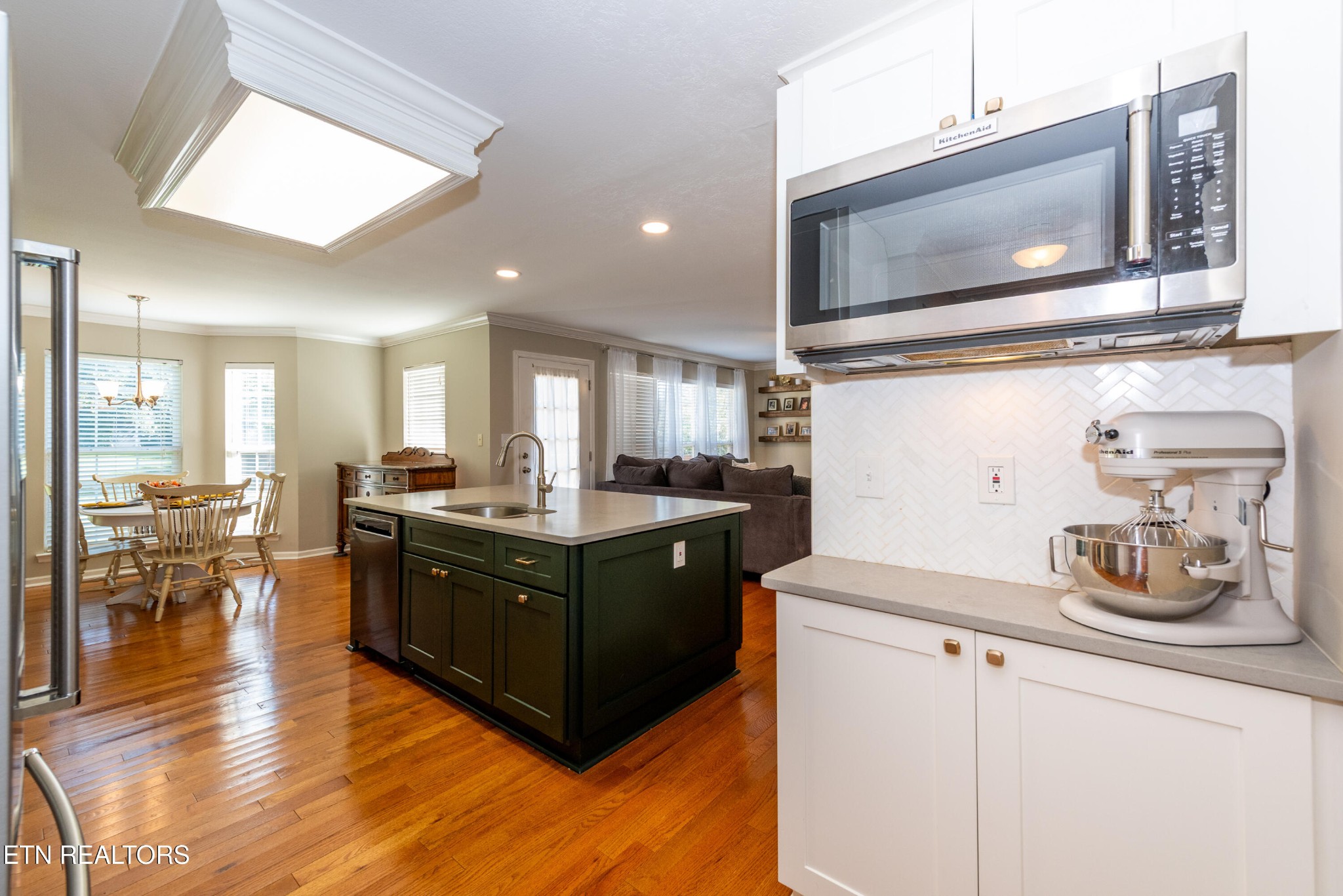 1600 Legacy Park Road Knoxville, TN 37922 - Photo 21 of 58 a kitchen with stainless steel appliances granite countertop a stove a sink and a microwave