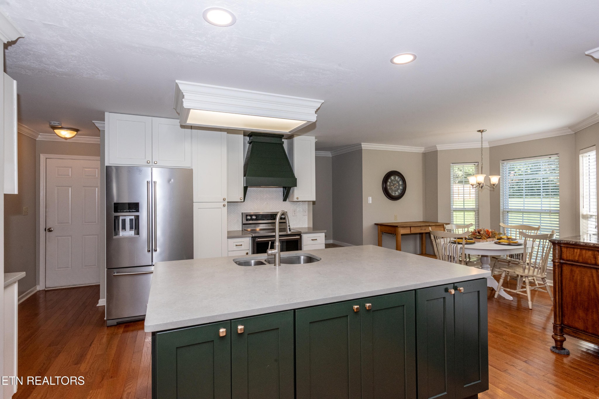 1600 Legacy Park Road Knoxville, TN 37922 - Photo 25 of 58 a kitchen with stainless steel appliances a sink stove and refrigerator