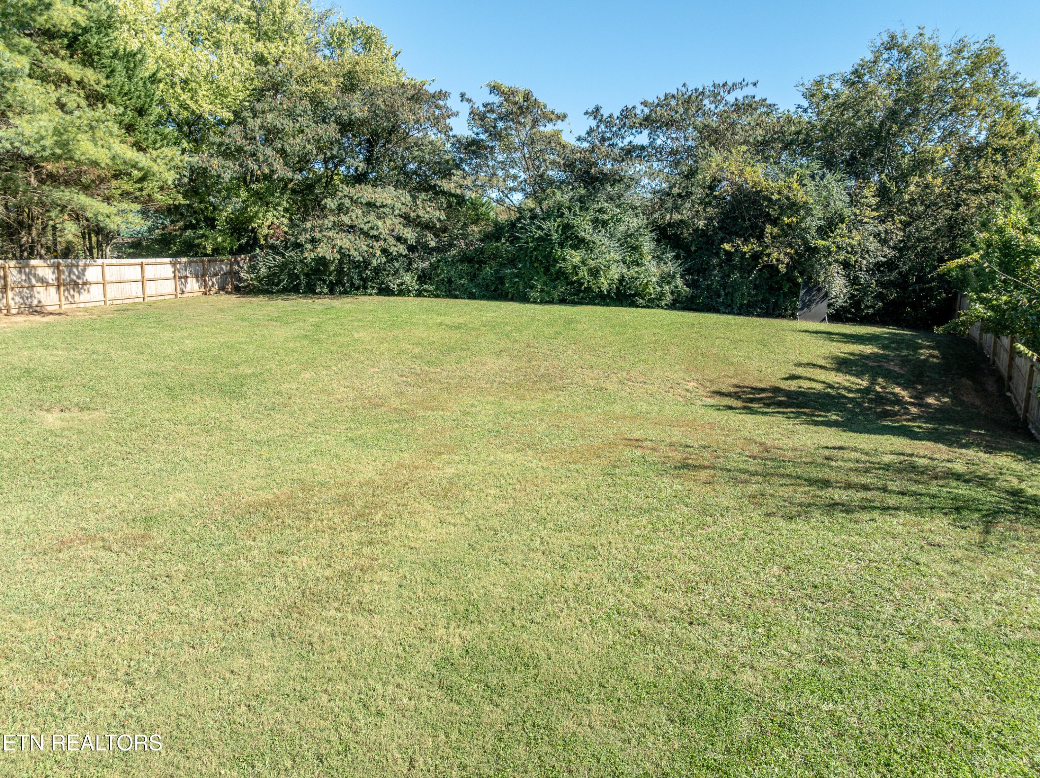 1600 Legacy Park Road Knoxville, TN 37922 - Photo 3 of 58 a view of a field with a trees in the background