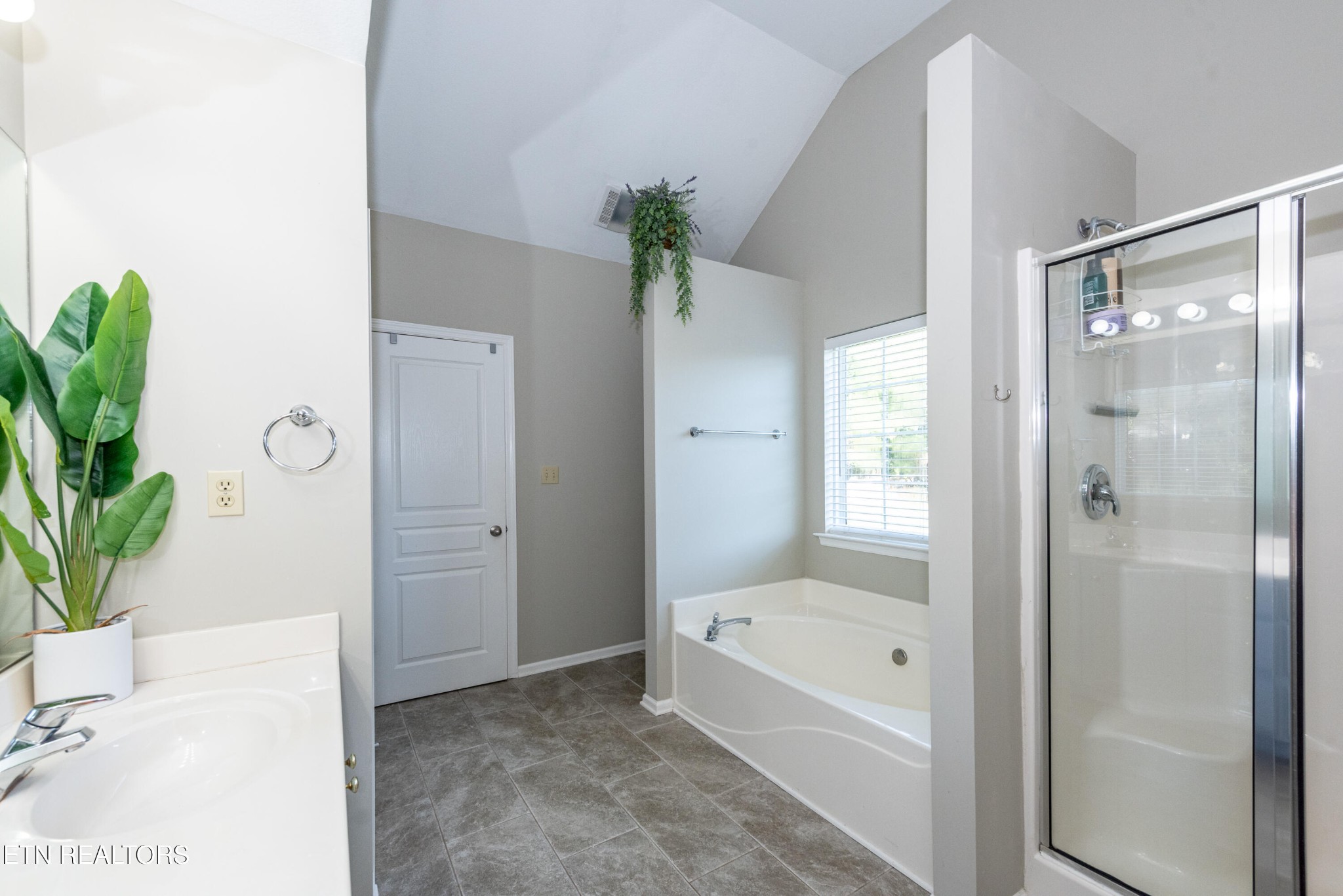 1600 Legacy Park Road Knoxville, TN 37922 - Photo 31 of 58 a bathroom with a bathtub and a shower