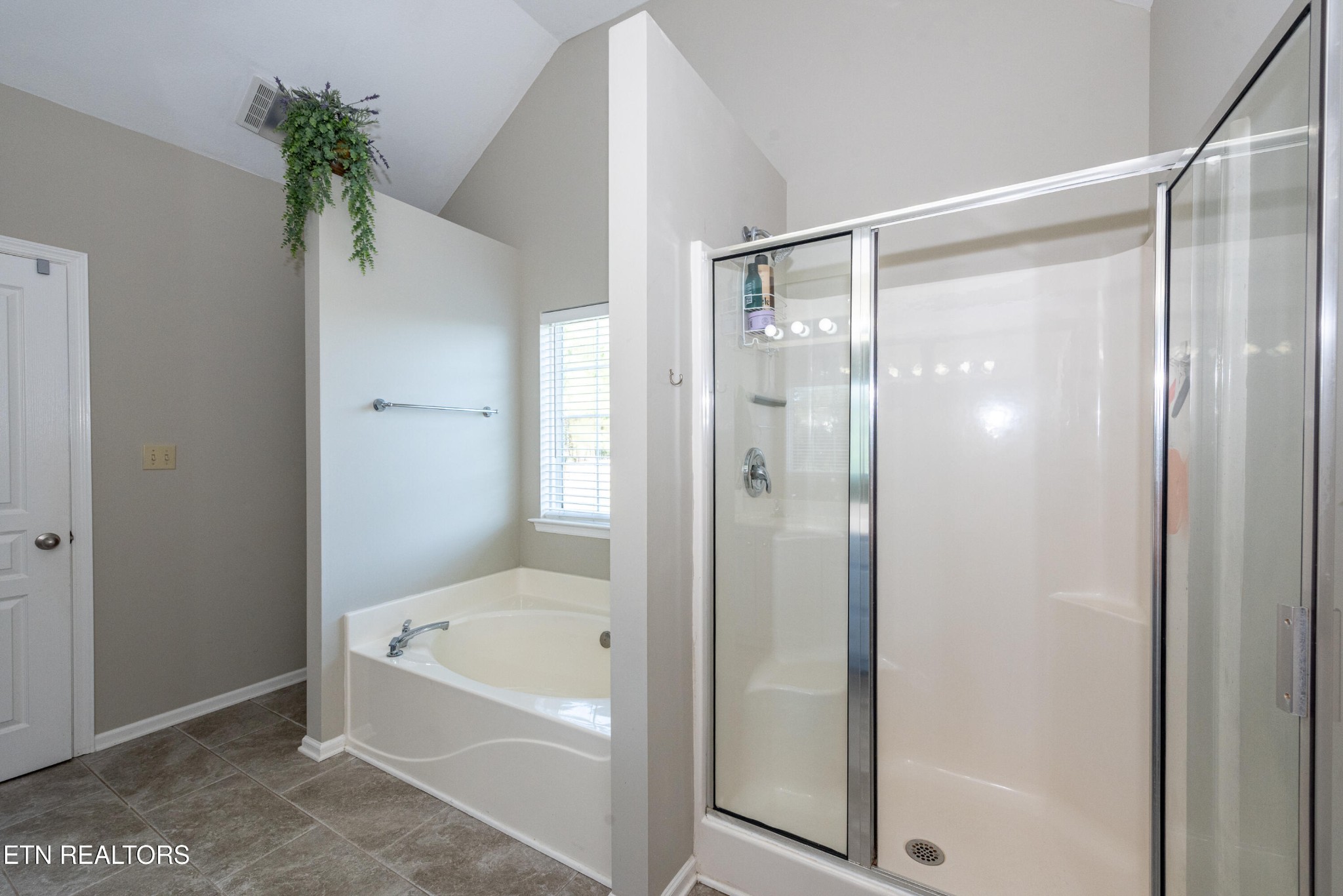 1600 Legacy Park Road Knoxville, TN 37922 - Photo 32 of 58 a bathroom with a tub shower and sink