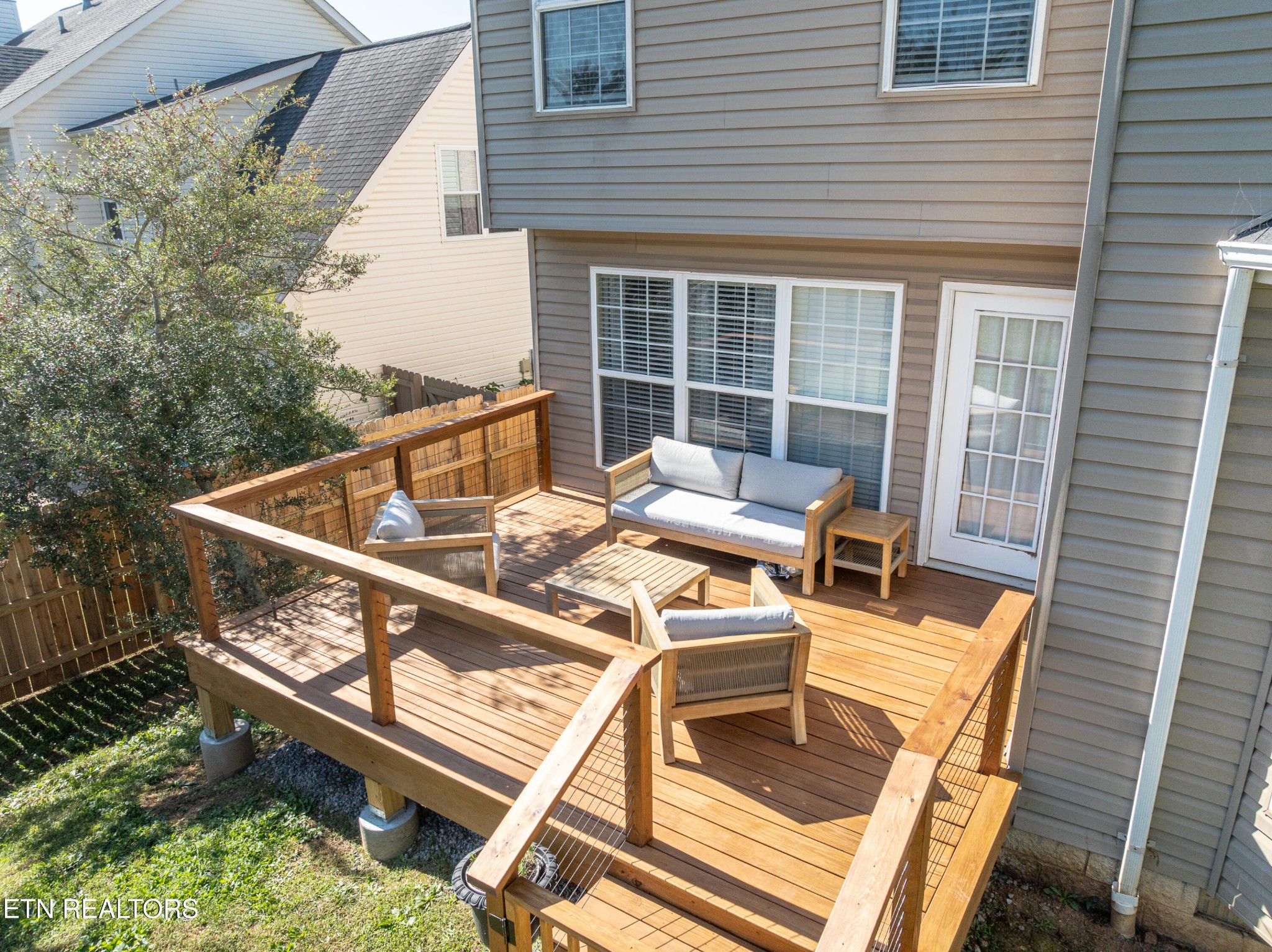 1600 Legacy Park Road Knoxville, TN 37922 - Photo 53 of 58 a view of a patio with a table and chairs