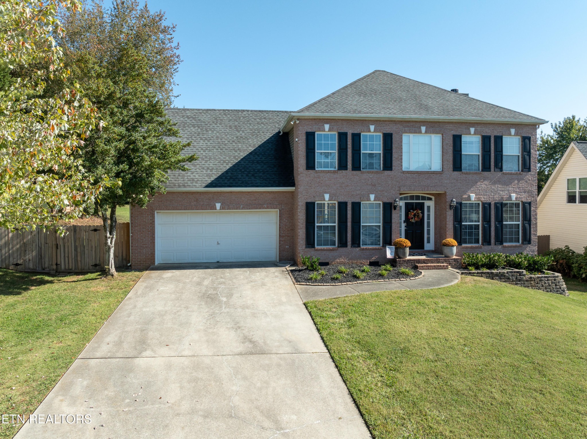 1600 Legacy Park Road Knoxville, TN 37922 - Photo 58 of 58 a front view of a house with patio and garden