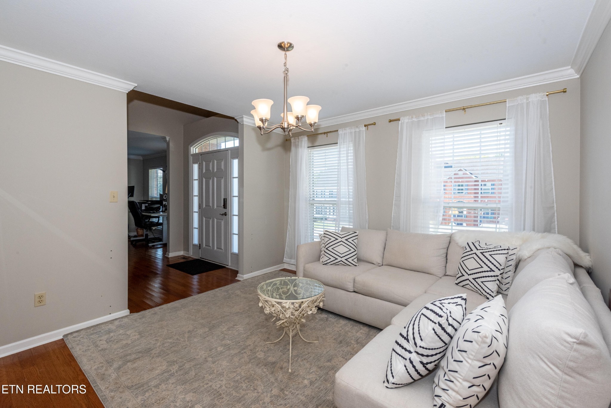 1600 Legacy Park Road Knoxville, TN 37922 - Photo 8 of 58 a living room with furniture and a chandelier