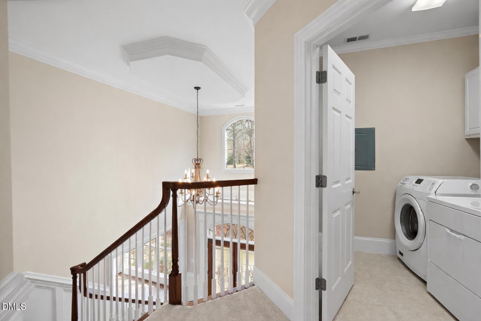 1525 Eglantyne Court Raleigh, NC 27613 - Photo 63 of 105 Bright hallway with laundry room view