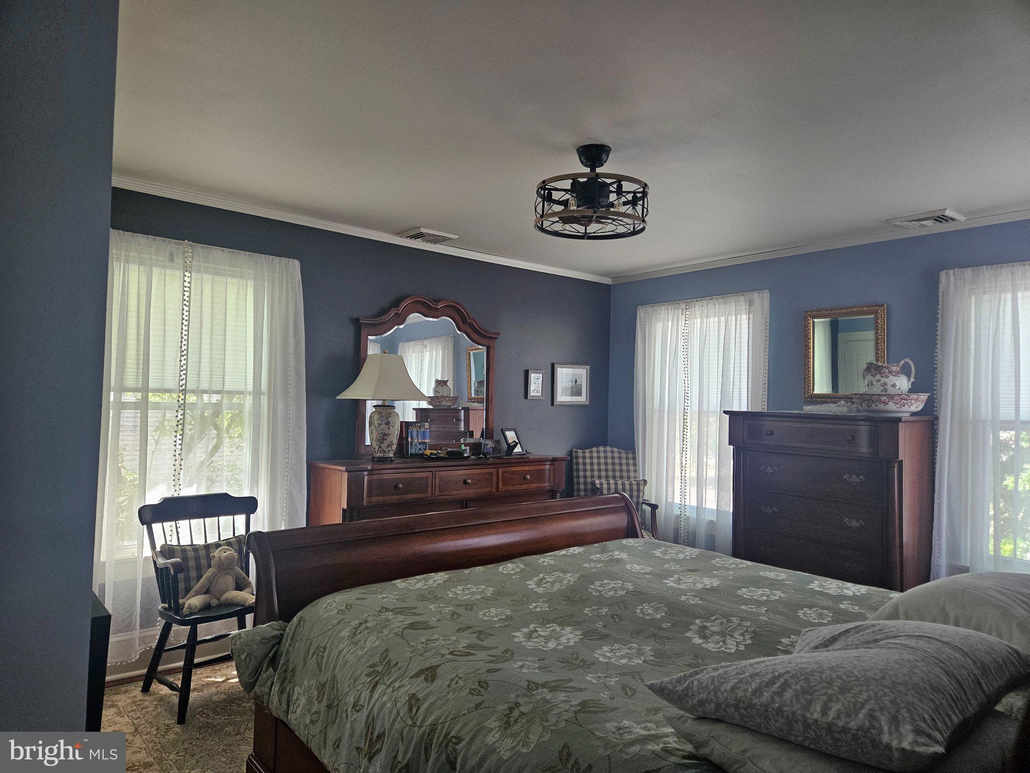 202 Central Avenue Ridgely, MD 21660 - Photo 17 of 22 Serene bedroom with natural light.