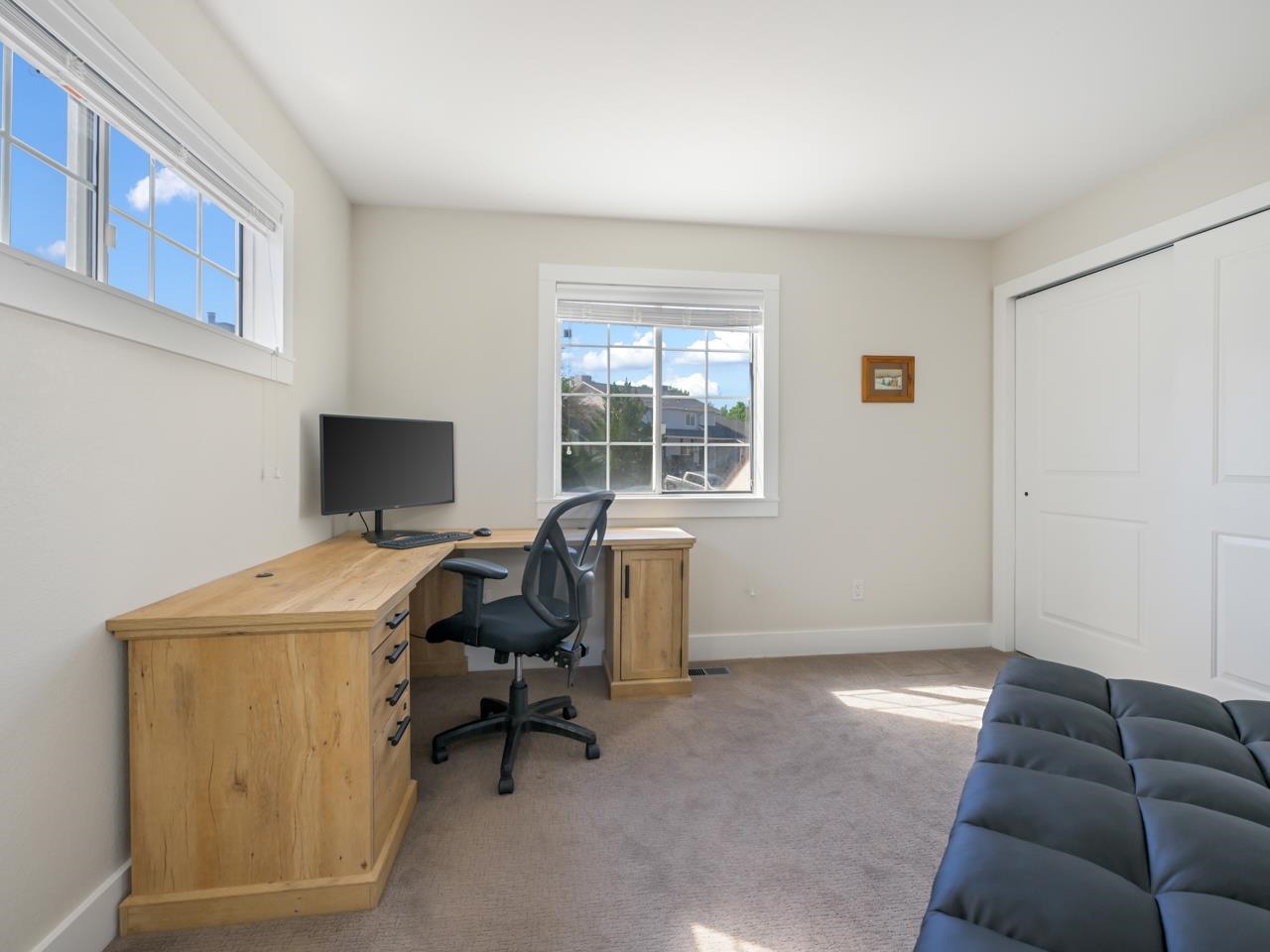 383 Explorer Court, Unit B Grand Junction, CO 81507 - Photo 27 of 40 a view of a livingroom with workspace and a window