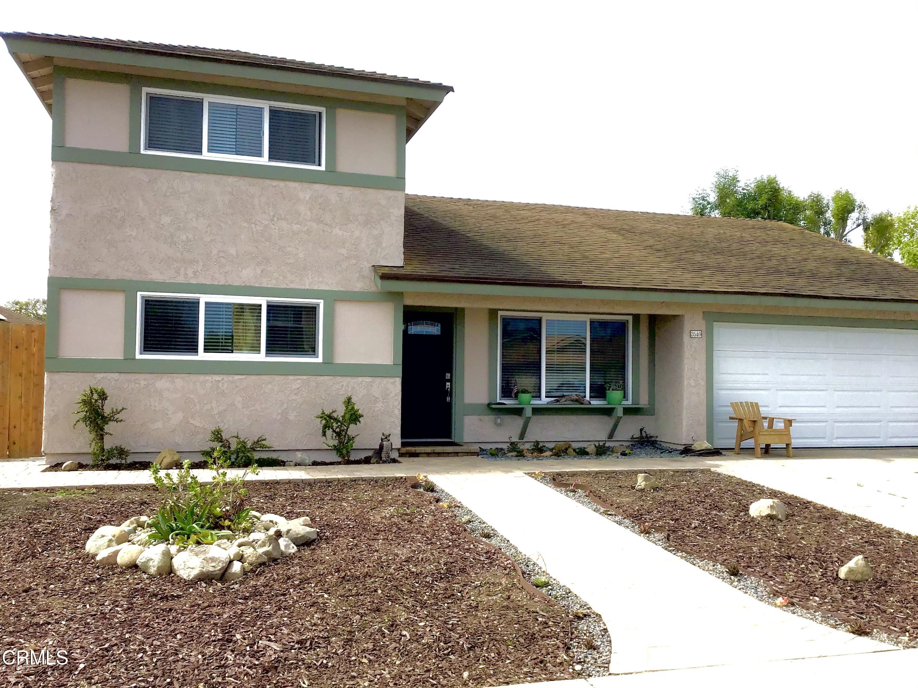3540 Regatta Place Oxnard, CA 93035 - Photo 1 of 5 a front view of a house with a yard