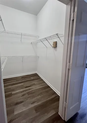 a view of a room with racks on the wall