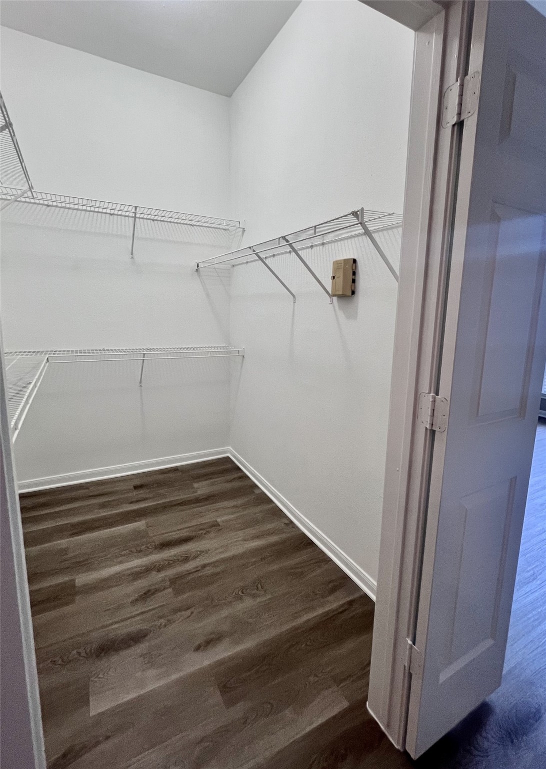 5353 Memorial Drive, Unit 1017 Houston, TX 77007 - Photo 4 of 23 a view of a room with racks on the wall