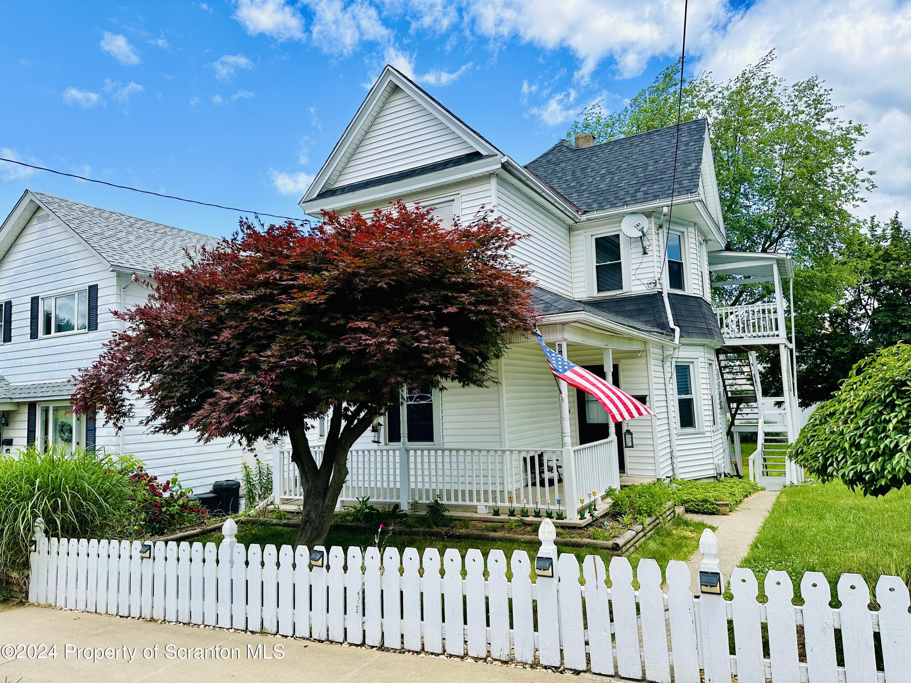 631 Cherry Street Scranton, PA 18505 - Photo 1 of 17 a front view of house with yard