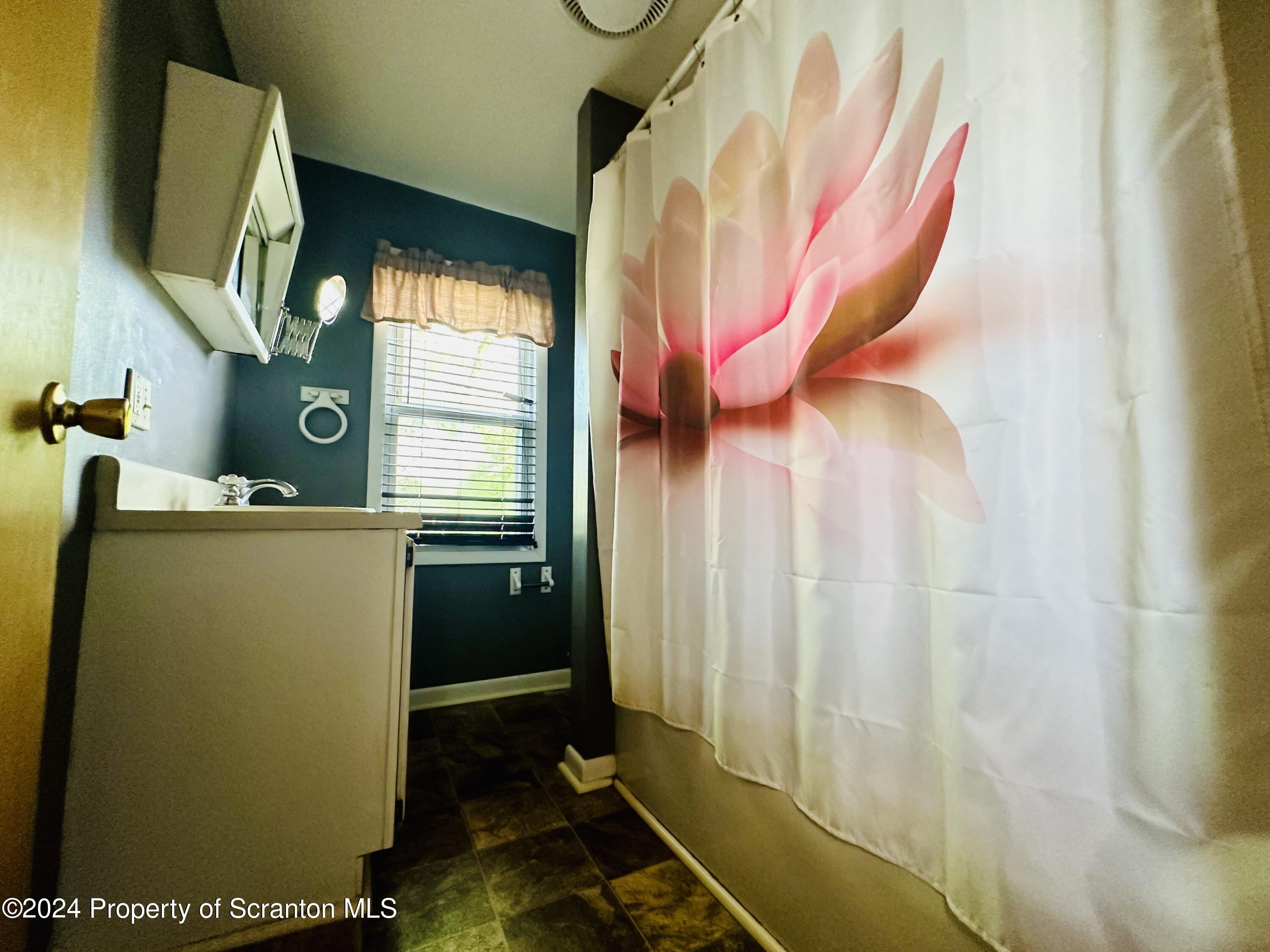 631 Cherry Street Scranton, PA 18505 - Photo 17 of 17 a room with a washer and dryer