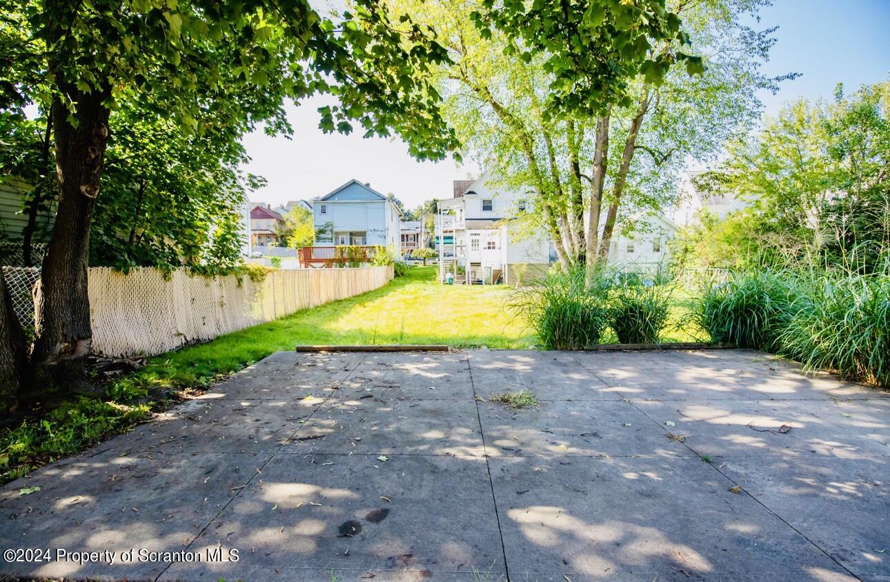 631 Cherry Street Scranton, PA 18505 - Photo 7 of 17 a view of a house with swimming pool