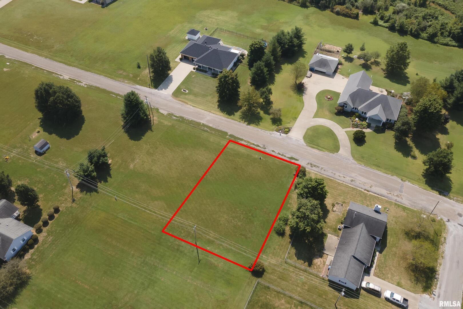 0 Eric Lane McLeansboro, IL 62859 - Photo 7 of 8 an aerial view of a house with a swimming pool