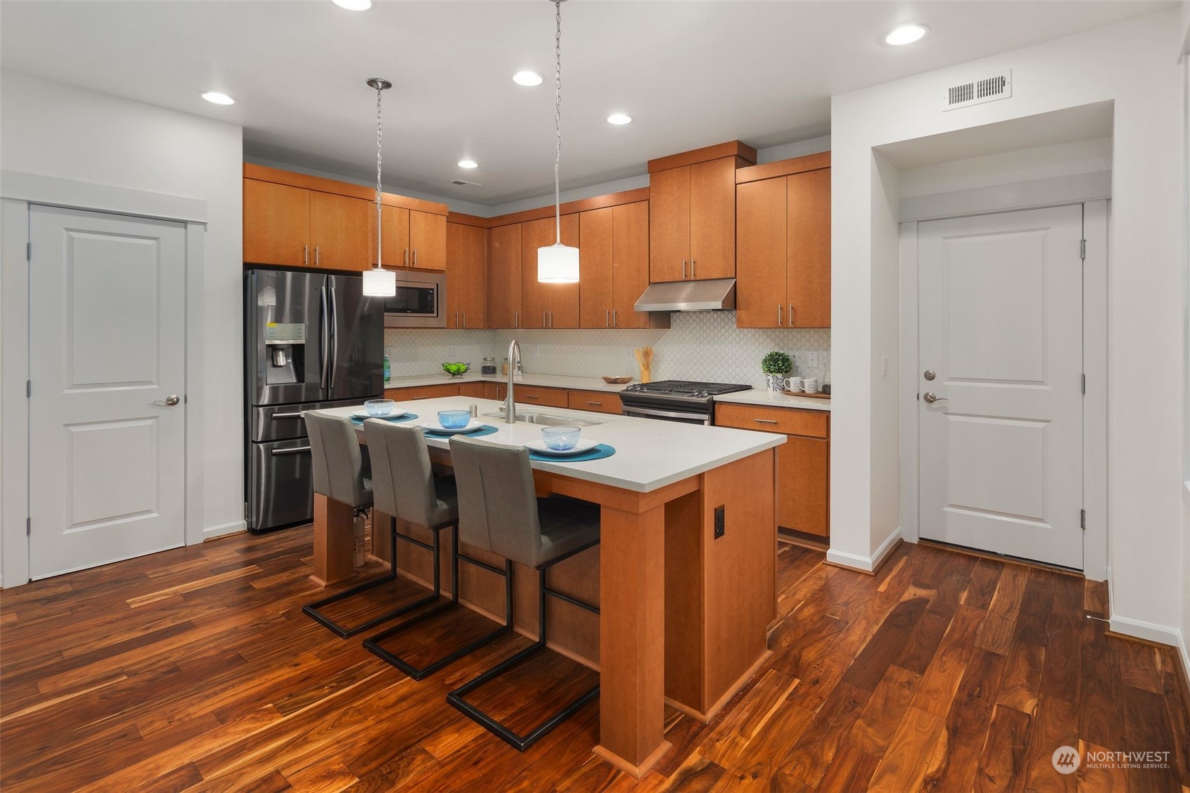 4429 186th Place Southeast Bothell, WA 98012 - Photo 12 of 37 a kitchen with granite countertop a sink appliances and cabinets