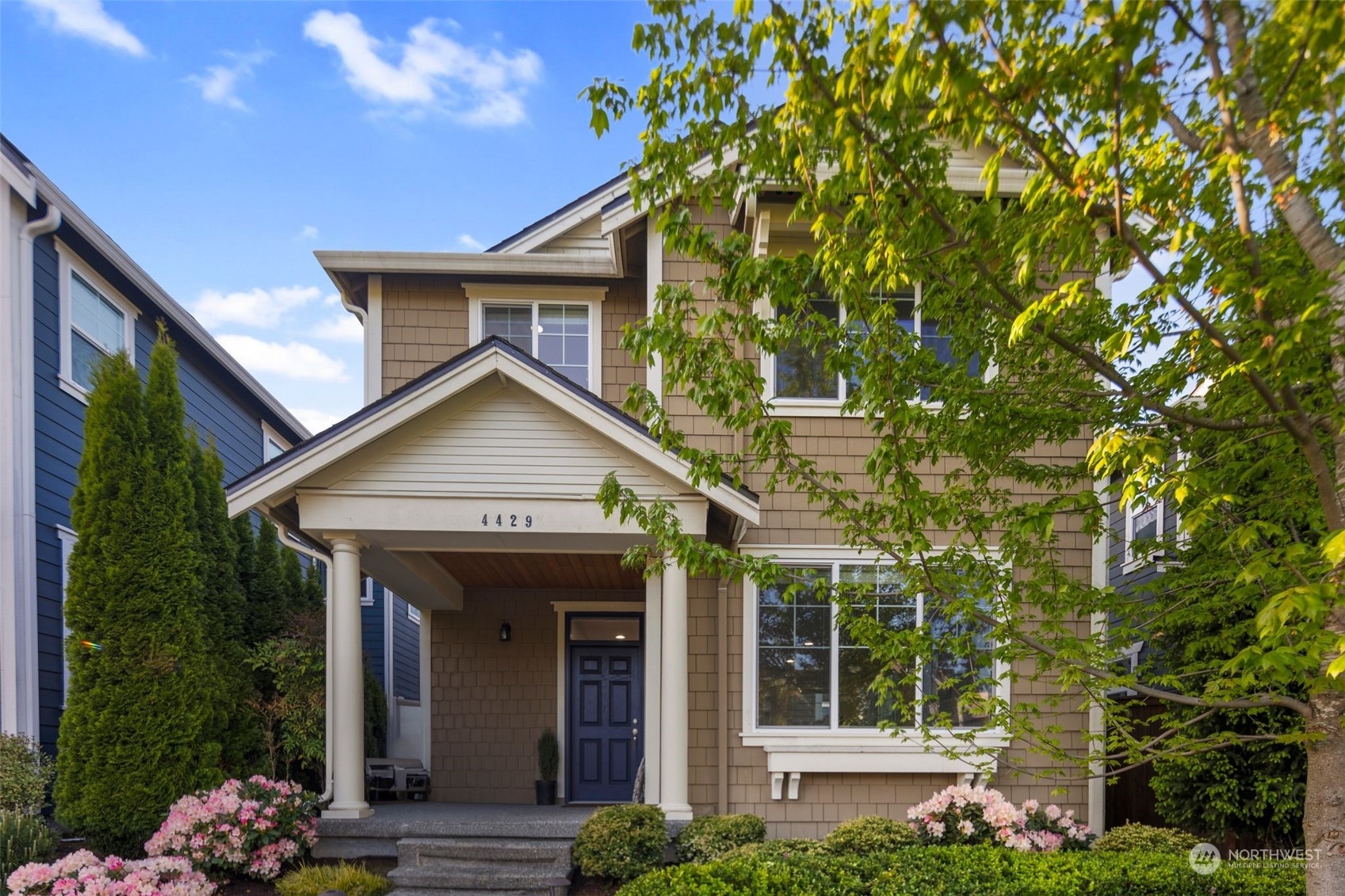 4429 186th Place Southeast Bothell, WA 98012 - Photo 2 of 37 a view of a house with potted plants and large tree