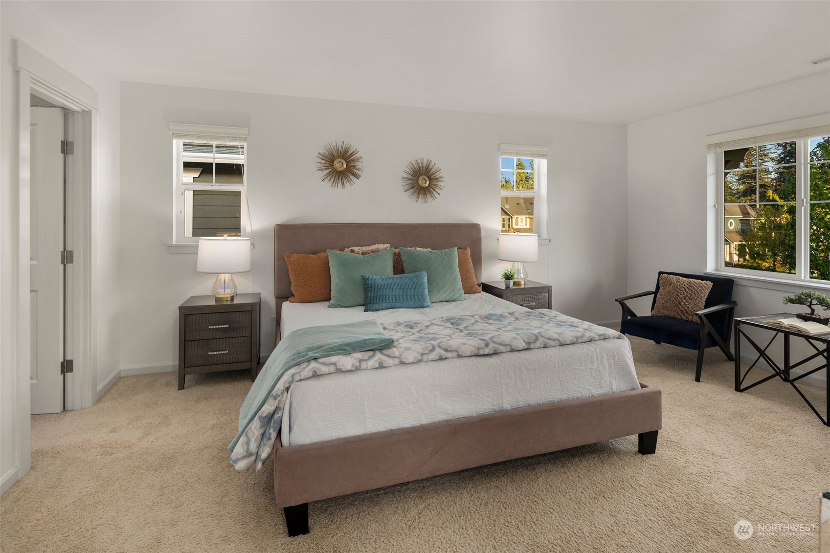 4429 186th Place Southeast Bothell, WA 98012 - Photo 22 of 37 a bedroom with a bed a table and a window