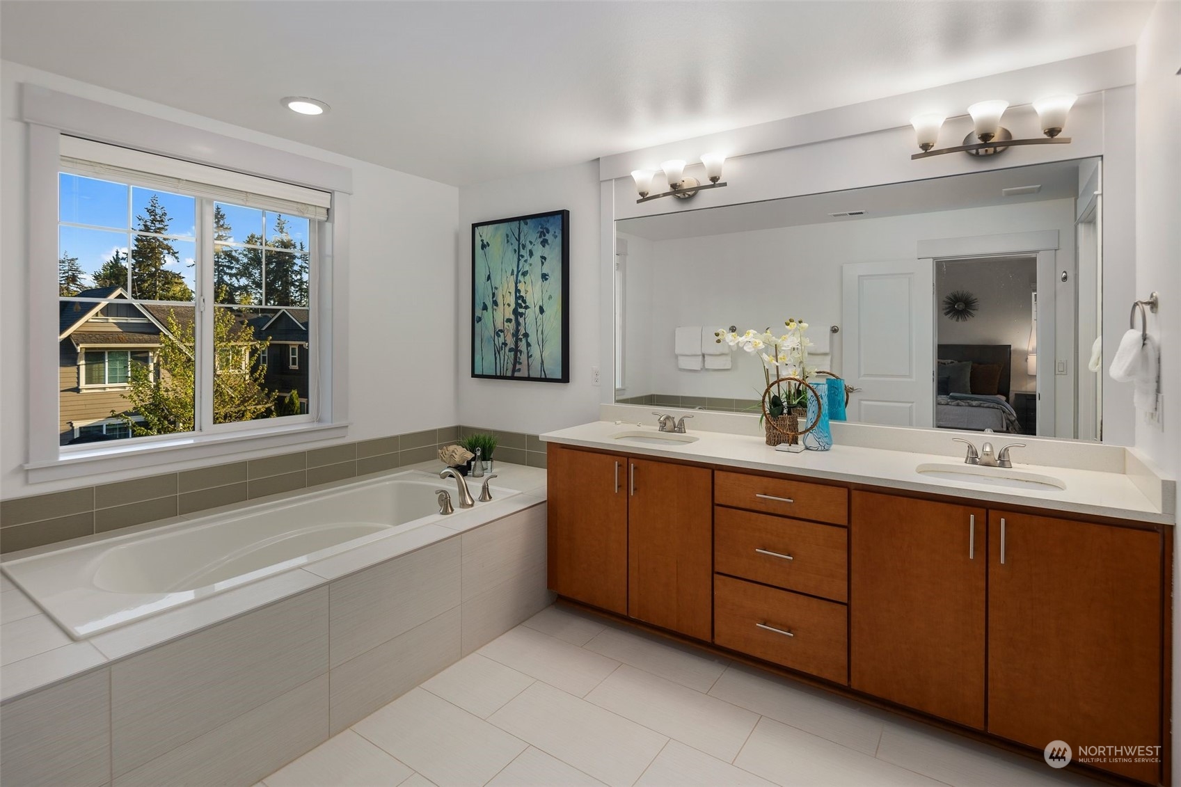 4429 186th Place Southeast Bothell, WA 98012 - Photo 23 of 37 a spacious bathroom with a tub sink and mirror