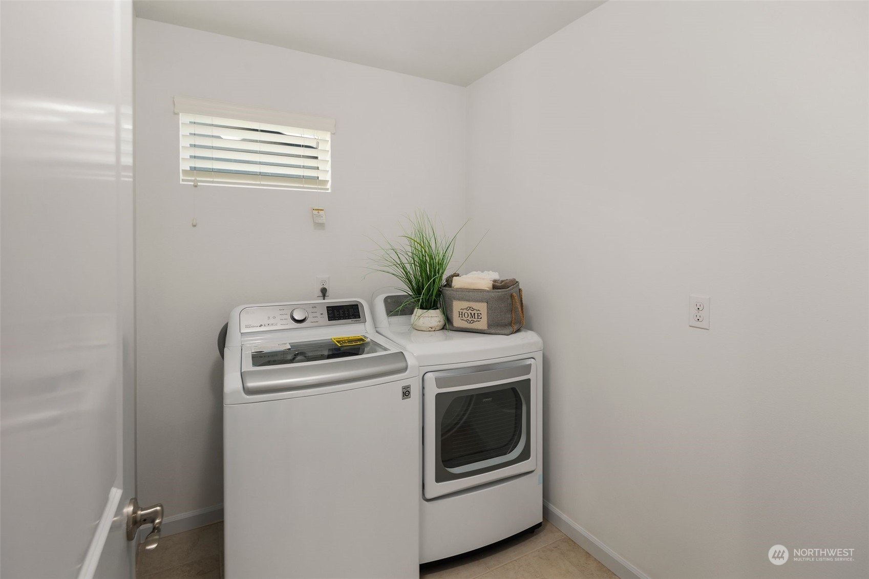 4429 186th Place Southeast Bothell, WA 98012 - Photo 27 of 37 a view of storage and utility room with washer and dryer