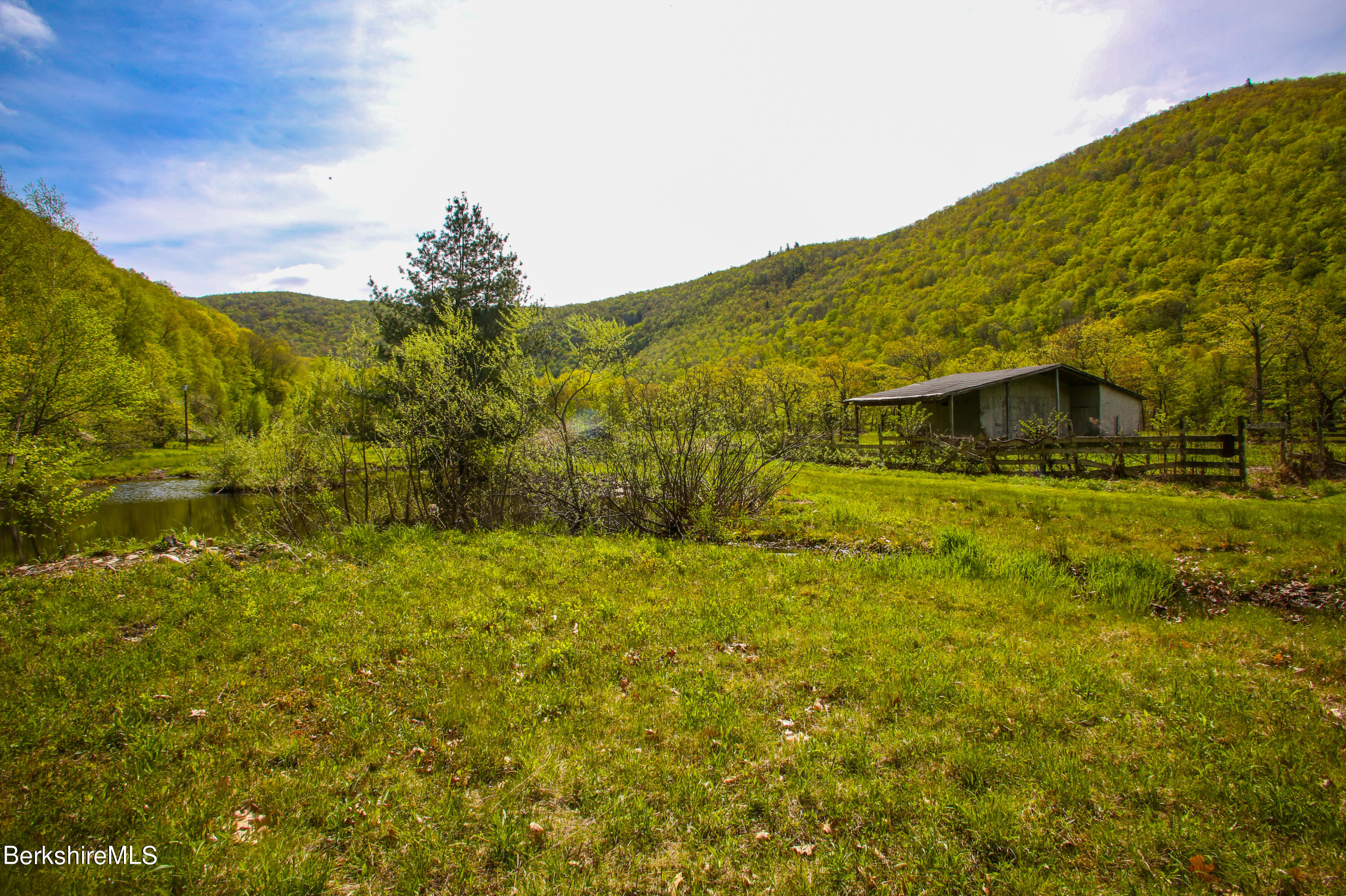 327 River Road Florida, MA 01247 - Photo 18 of 33 a yellow house with ocean view
