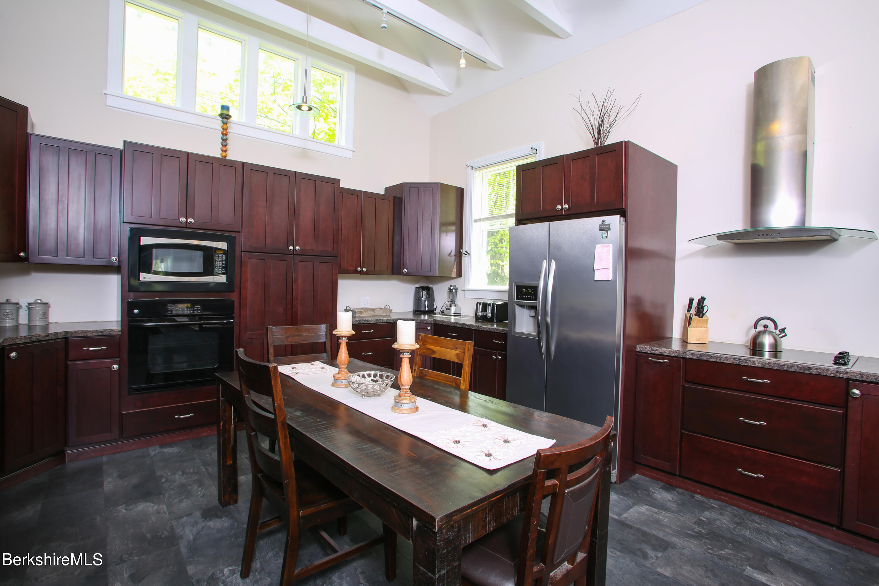 327 River Road Florida, MA 01247 - Photo 19 of 33 a kitchen with stainless steel appliances granite countertop a refrigerator stove microwave and sink