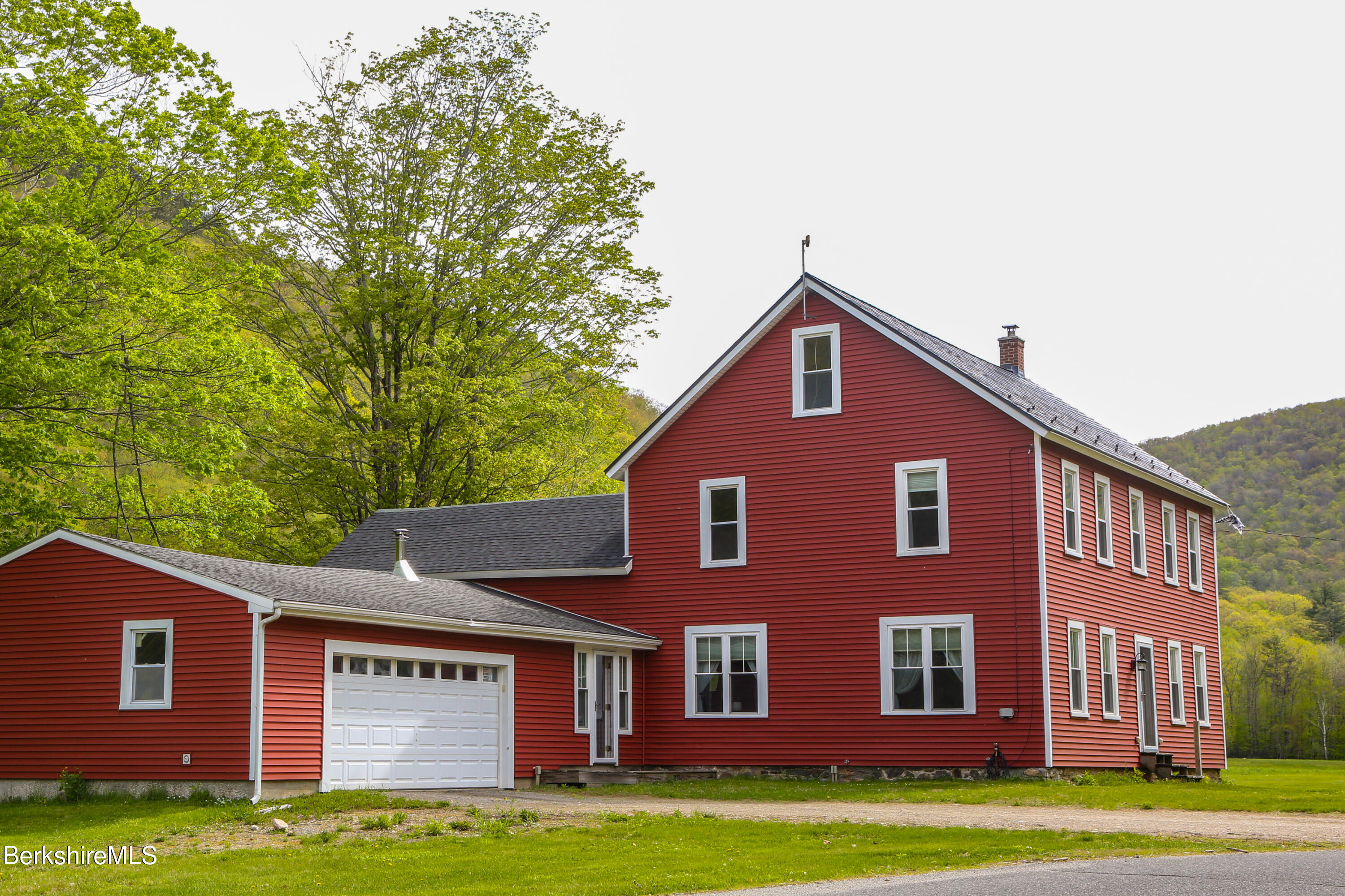 327 River Road Florida, MA 01247 - Photo 2 of 33 a front view of a house with garden
