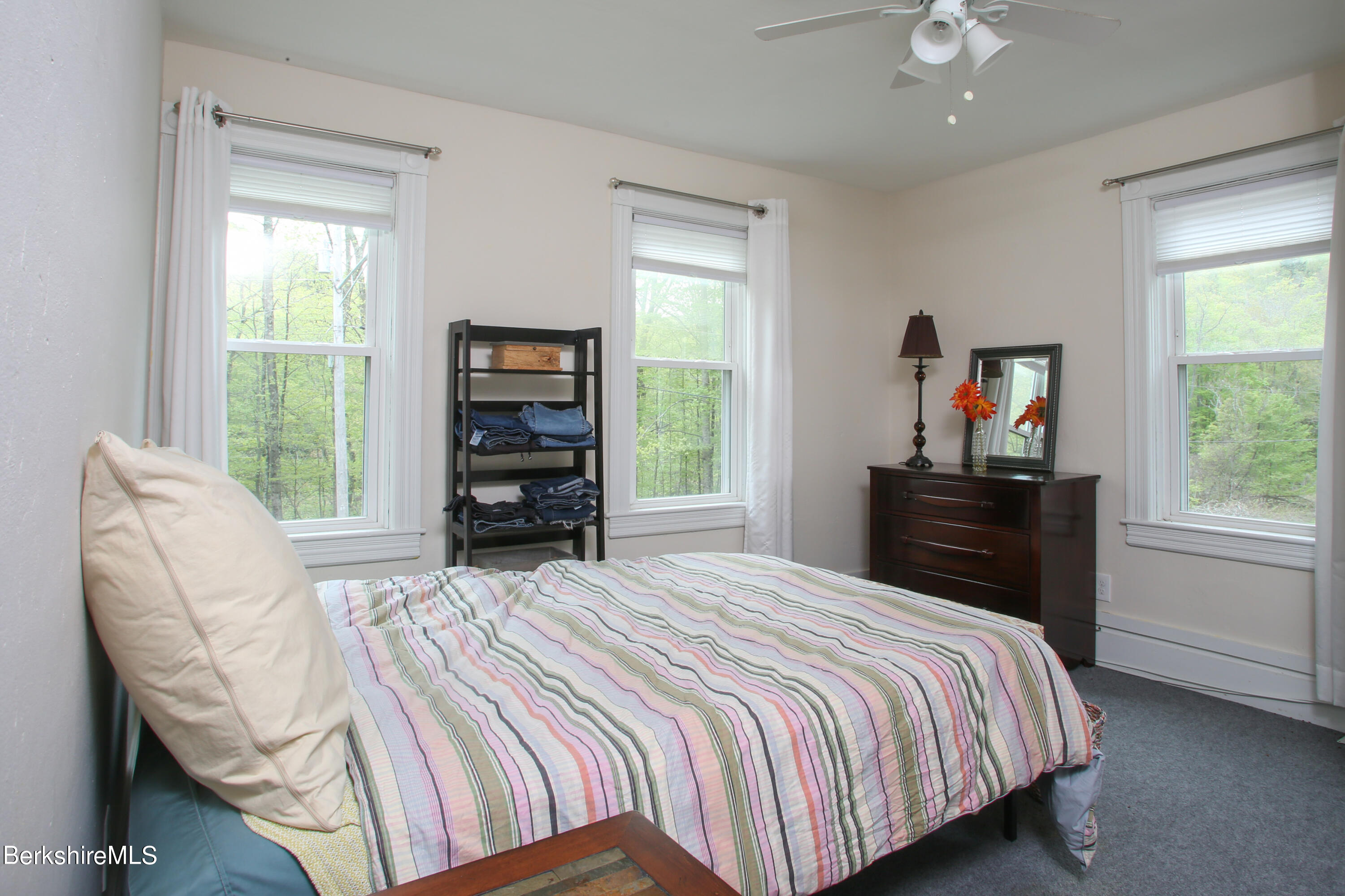 327 River Road Florida, MA 01247 - Photo 25 of 33 a bedroom with a bed and a television